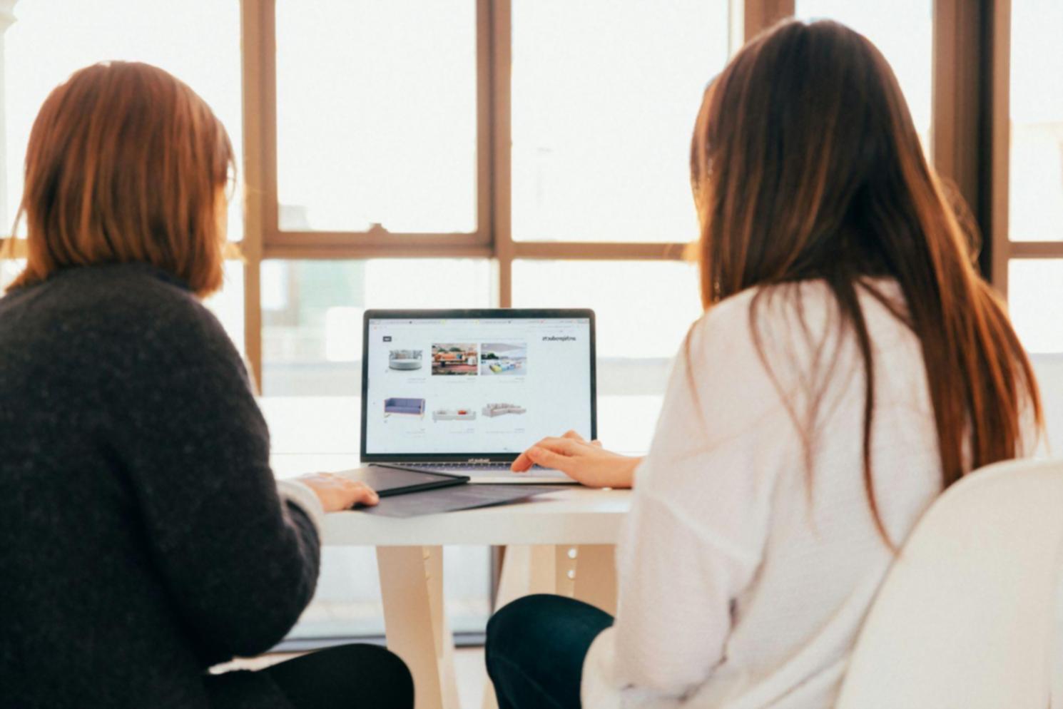 Startup team working on investor presentation materials